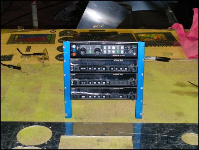 Install the over priced Radiorax tray mount system.  Yes, I said over priced.  I sure wish I could get people to pay $375.00 for two little angles and a few screws.  The system may be over priced, but it sure is nice to be able to position the trays exactly where you want them.