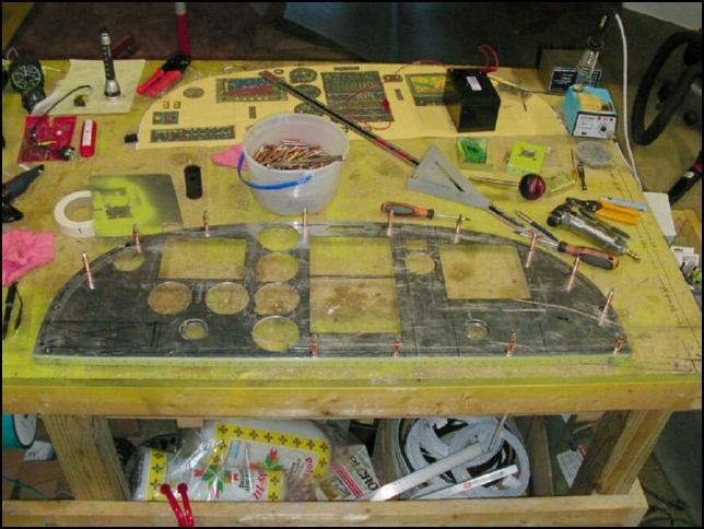 Drill and cleco the instrument panel to the instrument panel backing plate that will be riveted in the fuselage.