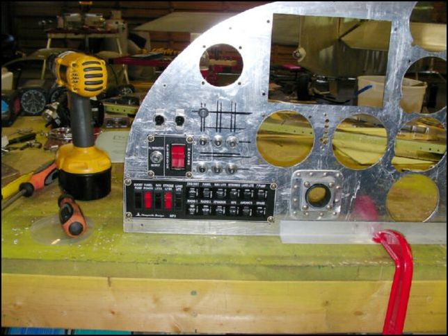 Install the power panel, master switch, and breakers.