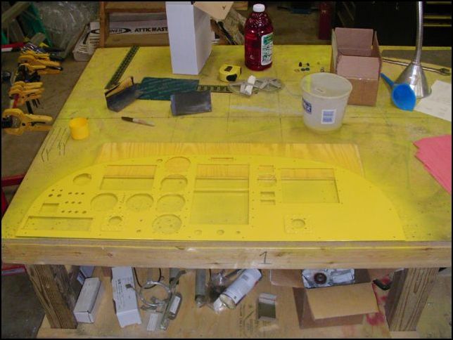 Deburr, clean, prime, and paint the instrument panel