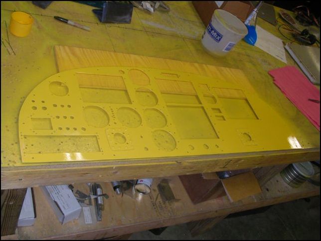 Deburr, clean, prime, and paint the instrument panel