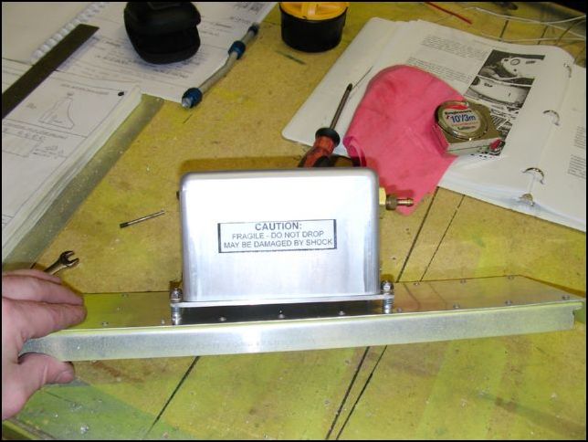 Mount the AHRS to the mounting plate.