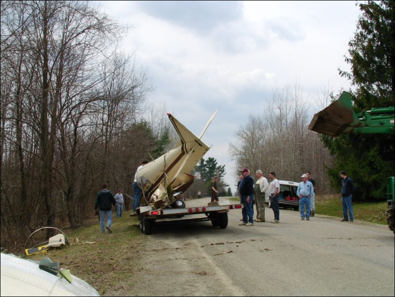 Lift fuselage on to trailer.  Pick up all the parts and let's all go home.  THANK YOU EVERYONE for all your hard work at cleaning up the mess that I made.