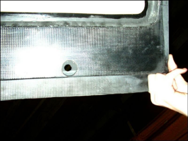 Drill hole in pilot side door for handle