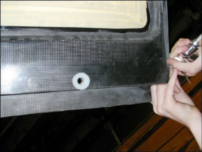 Insert bushing in door.