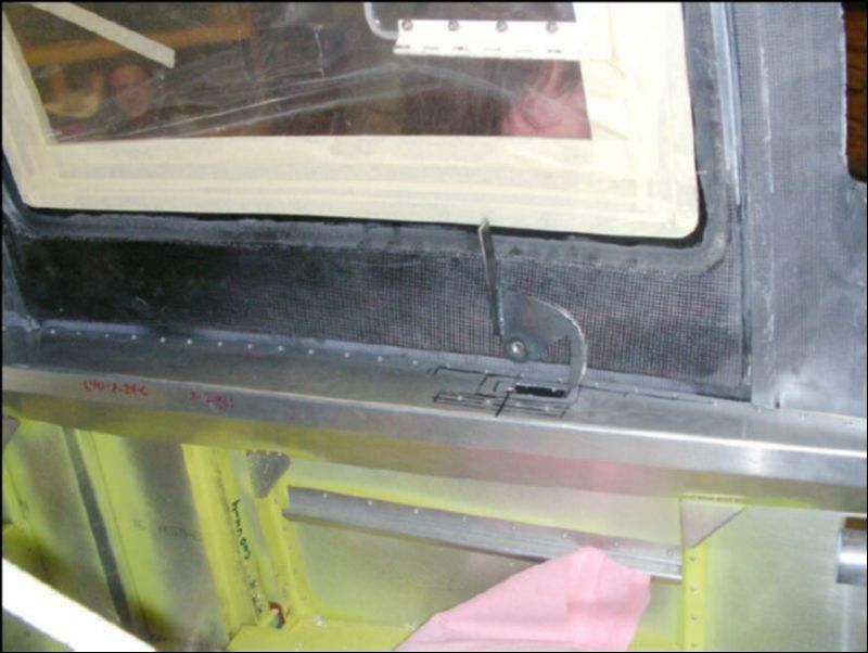 Insert inside latch in teflon bushing.