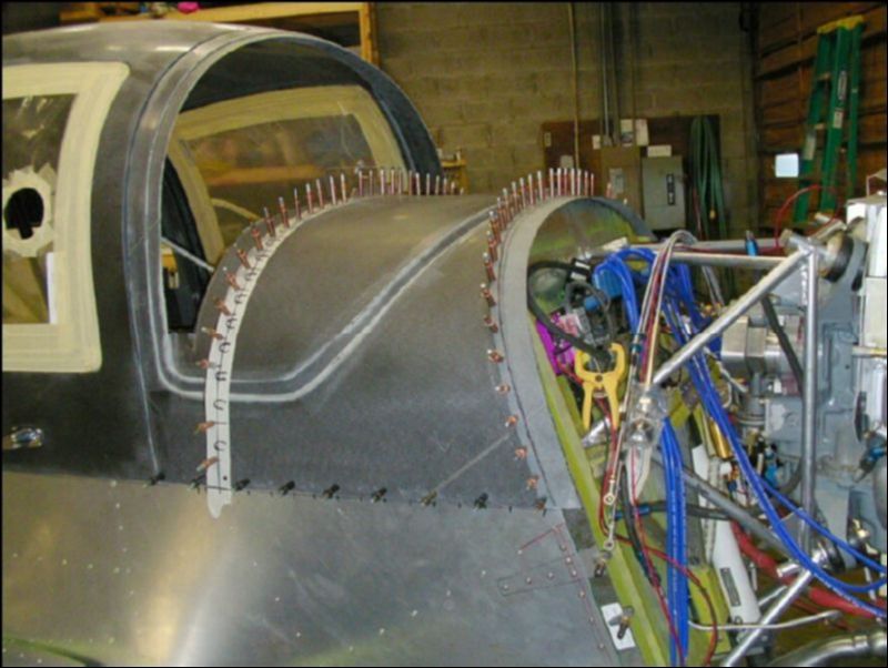 Drill and cleco the canopy to the firewall.