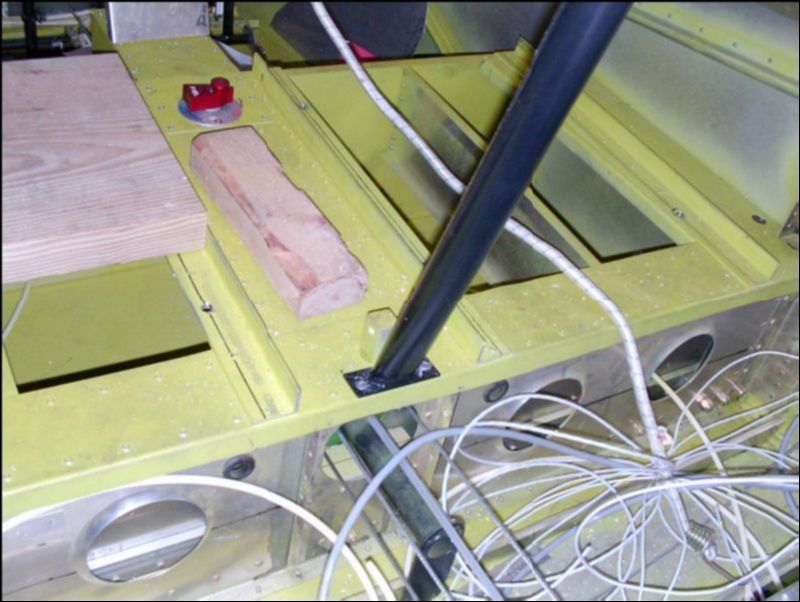 Rivet the bottom of the rollover bar with A6 rivets.