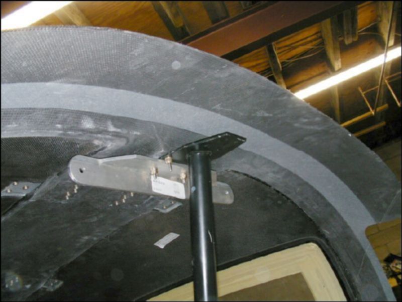 Drill through the top of the rollover bar through the canopy and install the four screws that hold it in place.  I also installed the bracket for the door struts at the same time.