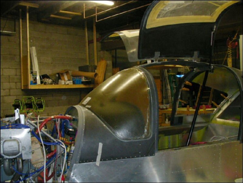 Cut windshield for proper fit.