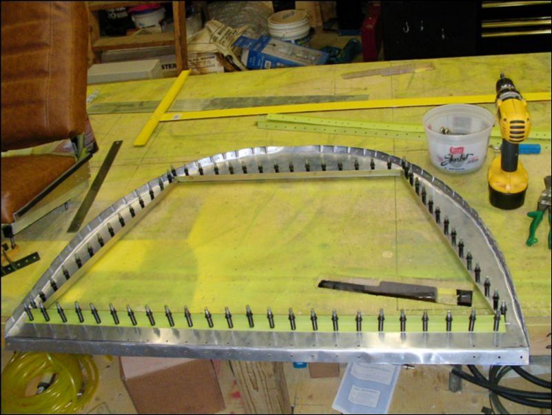 Fabricate a new baggage area bulkhead.