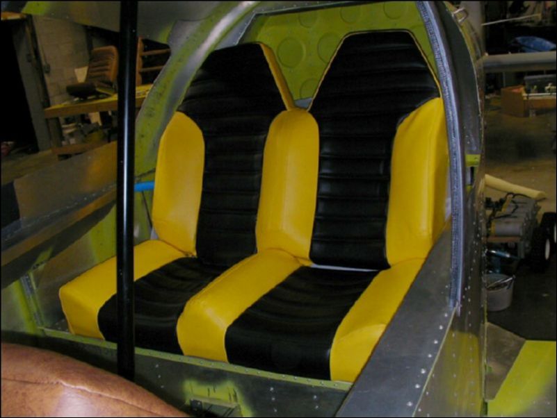 Test the new seat area.  I used the rear seat from my CH-300 just for a test.  It's too bad that the rear seat from the CH-300 is not wide enough to be used, but at least now I know that the rear seat area is nice and comfortable so that I can once again fabricate a rear seat and cover it to match the front seats.  I just hope that I can still purchase vinyl that will match the front seats.