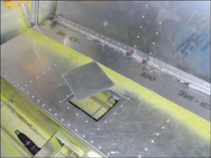 Rivet a lip around the bottom of the access hole in the rear seat bottom.