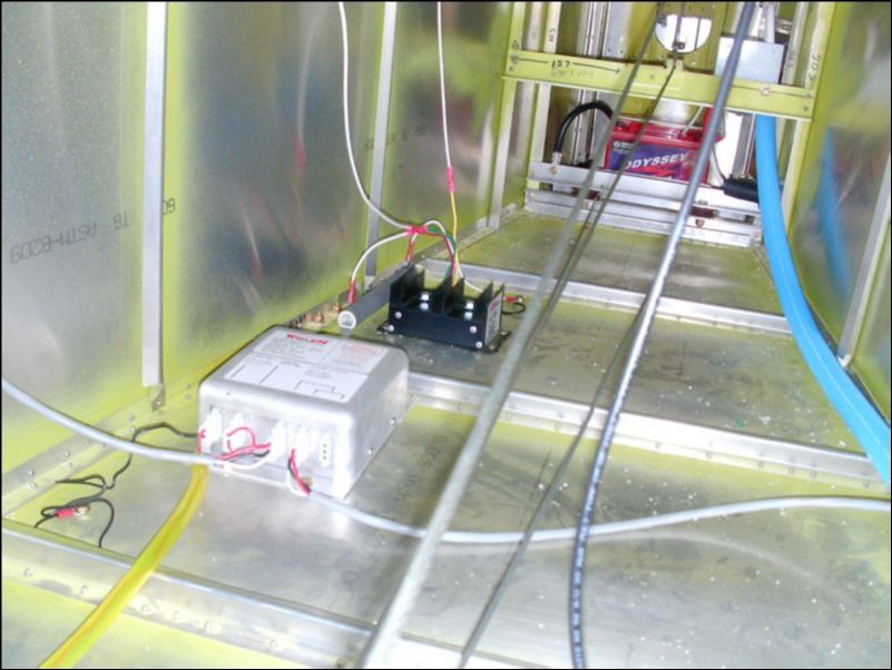 Install wing tip strobe power pack.