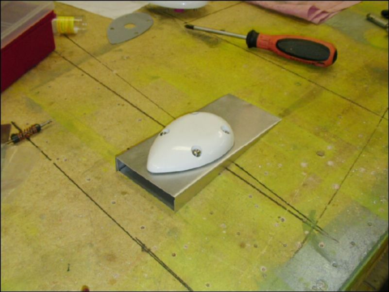 Test the fit of the GPS antennas to the mounting plates.