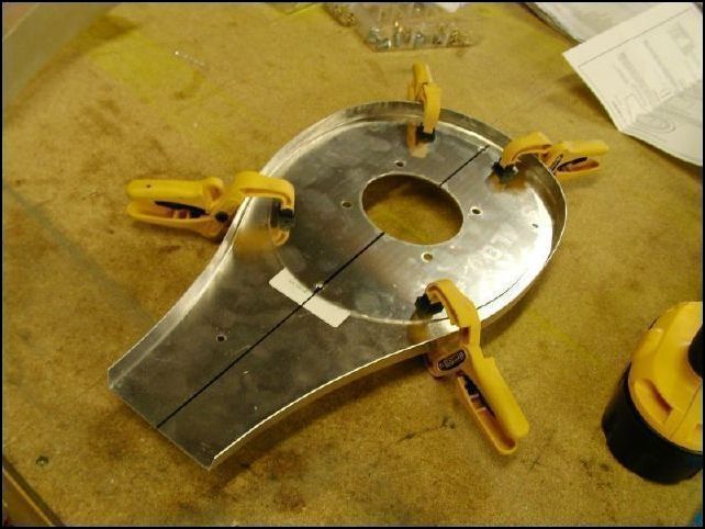 This airbox is a kit from Van's Aircraft.  First I had to clamp the mounting plate to the top airbox plate and drill the mounting holes.