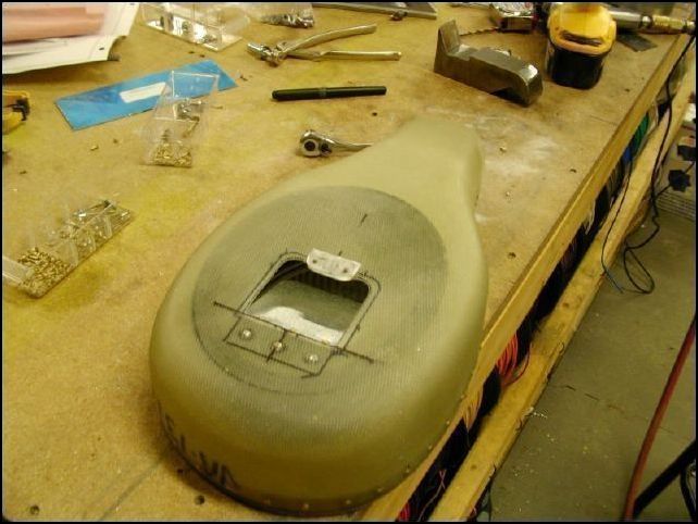 Airbox viewed from the bottom with the filter bypass flap open.