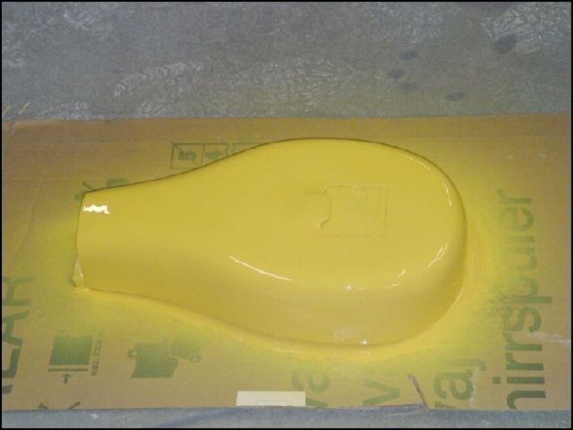 Another image of the airbox all painted.  I will let it dry and if needed apply another layer of paint.  Then clear coat it and paint the filter bypass flap black.