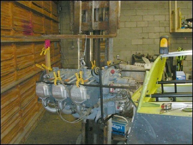 I called Zenair today and found out that the 2.5 degree offset of the engine needs to be set with the nose of the engine on the center line of the firewall. We need to figure out how much to move the rear of the engine to make a 2.5 degree offset.   So, if we all refer back to our calculus all we need to know is the distance from the nose of the engine to the firewall and then we take the tangent of 2.5 wich is .0437 and multiply that by the distance from the nose of the engine to the firewall which is 57 inches and that will give us the distance to move the rear of the engine if it was actually at the firewall which is 2.49 inches.  Now that we have that information all we have to do is bolt the dynafocal mount to the engine, lift the engine into position, and then move the rear of the engine so that if you drew a line through the center of the engine that line would be 2.49 inches off the center line toward the pilot.  Then you need to move the nose of the engine up or down to line up the center line of the engine to be parallel with the top longerons.  Now, raise the engine as high as you can on the firewall but be sure to leave room to clear your cowling.  TADA... your engine is now exactly where you want it to be.  Now wasn't that simple?