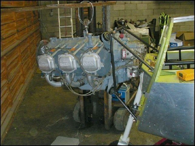 Now repeat the last step for the left side of the engine.  At this time the engine should be supported enough that you no longer need to have it lifted in place.  I tested mine and sure enough the fork lift was no longer needed.