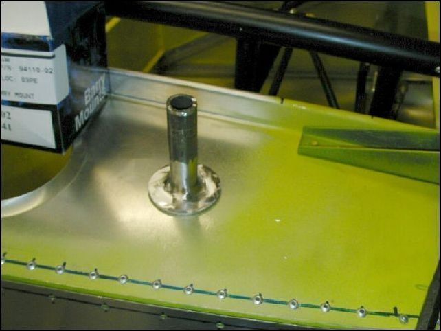 This is the firewall portion of the top engine mount that I made.  I am going to add an angle behind the firewall and drill a 1/2 inch hole in the center of it.  Then I will bolt this to that location with an AN8 bolt and weld rods from this to the top left and top right sections of the dynafocal ring.