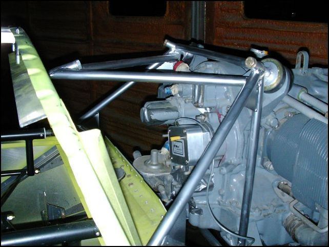 Removed the magneto coupling from the right mag and installed it on the timing-housing for my electronic ignition system.  I then set the engine to TDC, removed the gear retainer assembly and re-inserted the assembly so that the timing housing will clear the mounting bolts.  Then I installed the timing-housing to the right mag location.  I need to find slick magneto clips to finish installing the timing housing, for now it is just held in place with a washer and nut on the stud, this will hold for now but I would not want to run the engine this way.