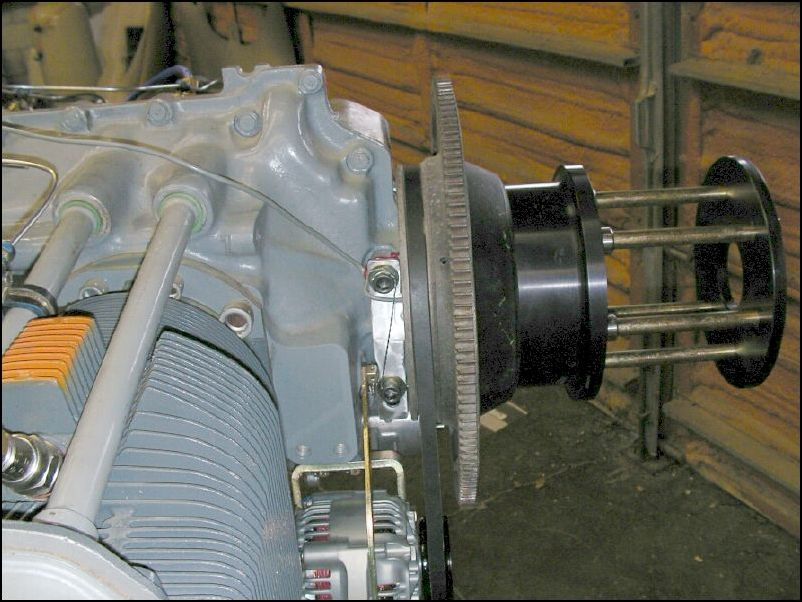 Re-install starter gear and prop extension.