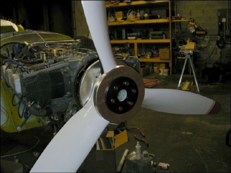 Install spinner back plate, prop, and crush plate.