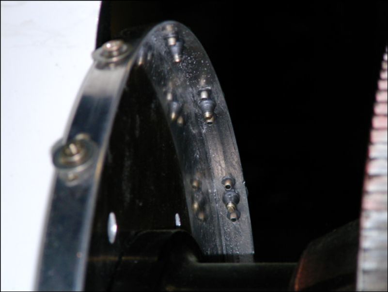 Remove spinner and install nuts to the spinner plate.