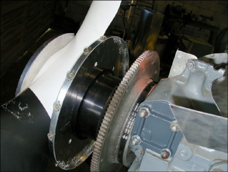 Remove spinner and install nuts to the spinner plate.