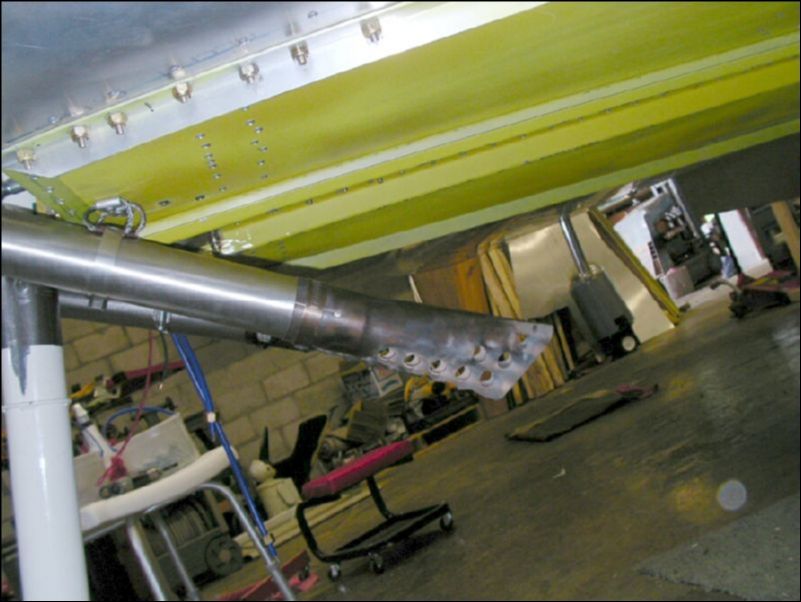 clamp exhaust pipe to stand offs and install piccolo tubes to end of pipe.  These lower the exhaust noise by about 3 db.