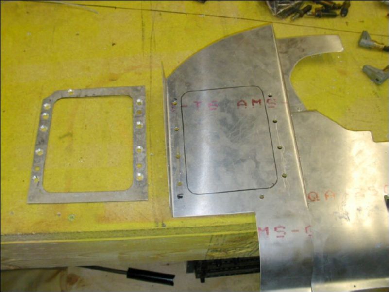 Make mounting ring for oil cooler.  Mark left rear engine baffle for oil cooler cutout.