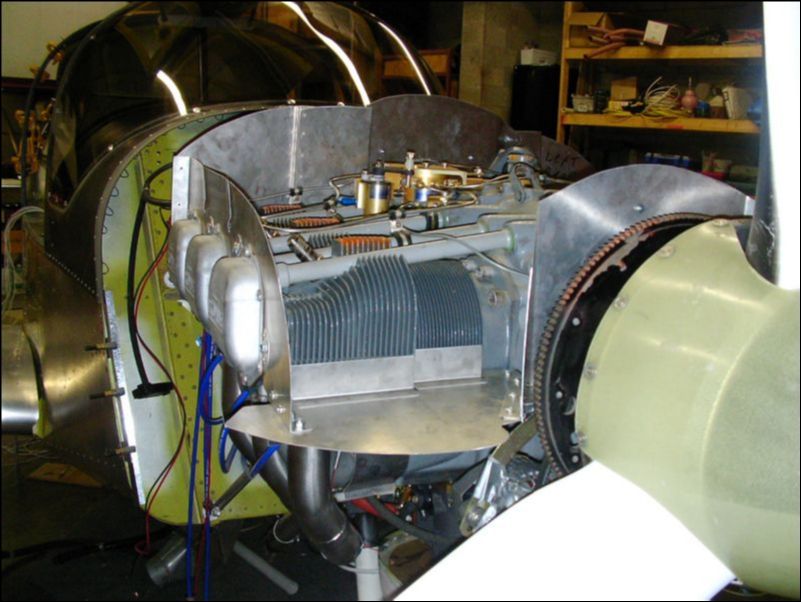 Fit the rest of the engine baffle, rivet and bolt the baffle where needed.