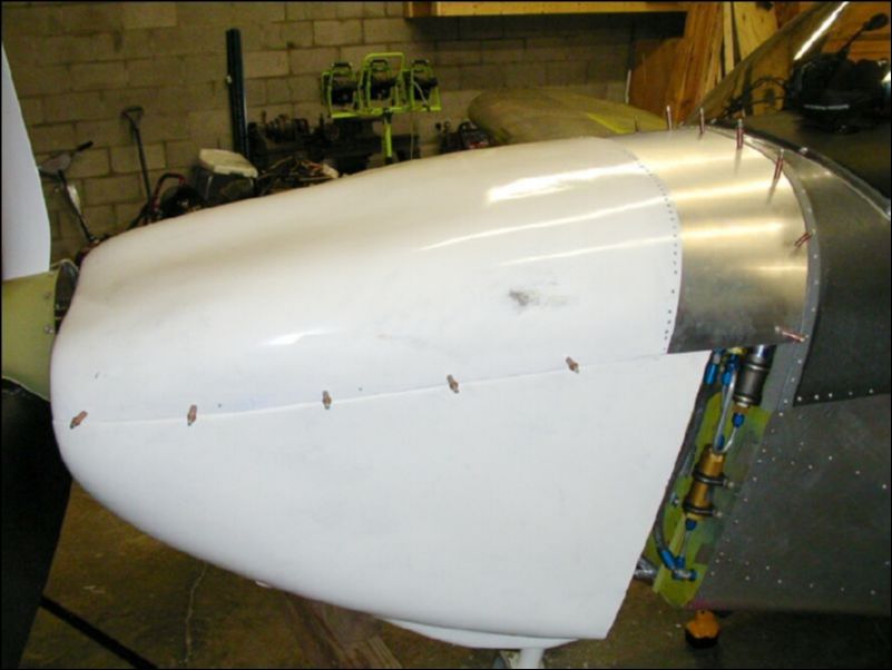 Position the bottom cowling, drill and cleco it to the top cowling in the locations where the camlocks will be installed.  Rivet the top cowling to the top cowling extension.