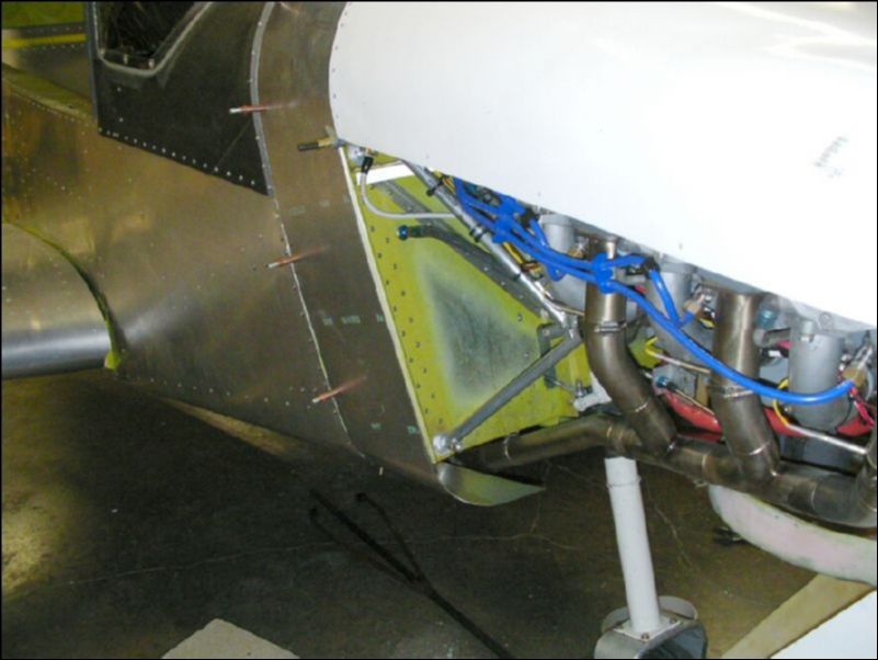 Fabricate bottom cowling extension.  Drill and cleco the extension to the fuselage in the locations where the camlocks will be installed.