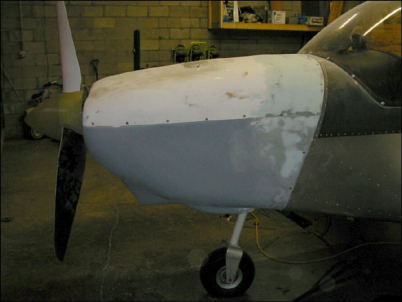 Install the rest of the camloc sockets for the cowling and then install the cowling to the aircraft.  Now it is time to make the top and lower cowling fit together smoothly before doing the final sanding.