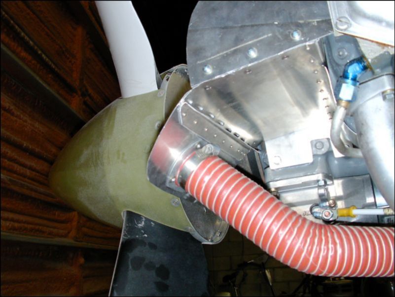 Install a flange to the engine baffle and connect the heat exchanger pipe.