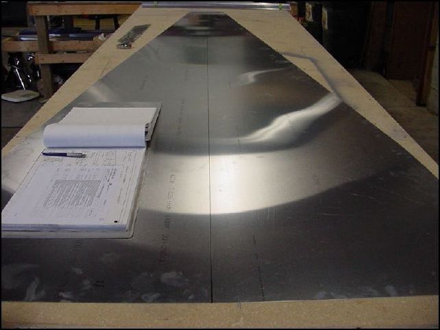 Place bottom skin flat on work bench and draw center line front to back
