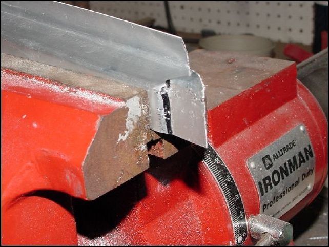 Cut the Z angles as per 640-F-1 drawing.  Once cut joggle the ends for proper overlap over the longerons.  This picture shows how I joggled the Z angles.  Be careful not to split the metal when you make these bends.  Go slow and easy and the ends will bend just fine.