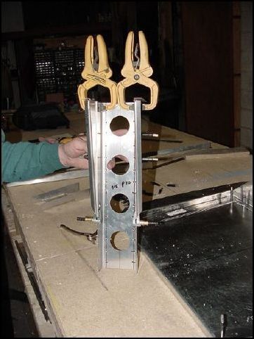 This image shows both gear angles clamped and clecoed to the center channel.