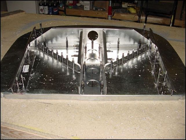 draw center line on 20-F-16-6R (firewall brace right) and 20-F-16-6L (firewall brace left).  Mark rivet hole locations AS 5 P40.  Place into position, drill, and cleco.