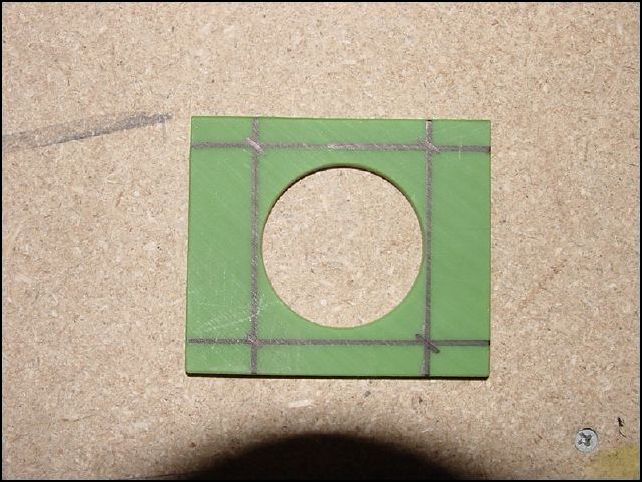 Mark 20-F-16-2 (upper nose gear bearing) 20 mm from each side and 10 mm from top and bottom.  Draw lines connecting these marks.