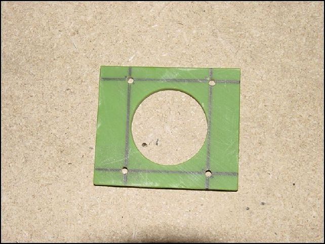 Drill holes for AN3 Bolts (#12 drill bit).  Clamp in position to F-16-1 (upper horizontal Z) and drill through bearing.  Once fit correctly be sure to remove and cut in half on horizontal center line.