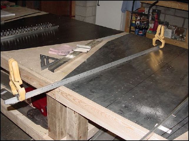 I created new longerons because I had messed up the ones that came with the kit when I tried to install them to the skin that was not punched correctly at the factory.  You should not need to do this step.  I simply cut two new longerons as per drawings then clamped them together and filed the ends to be exact matches.