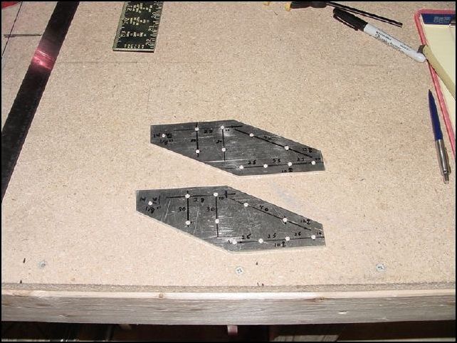 Drill rivet holes (AD-4).  Drill the spar attachment hole to 1/8