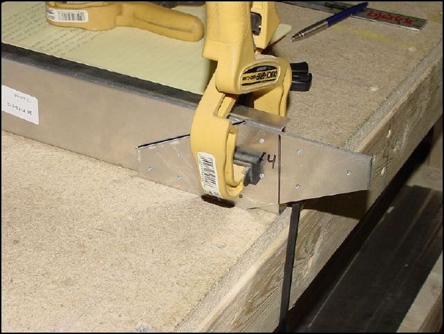 Position the brackets to the channel as per drawing.