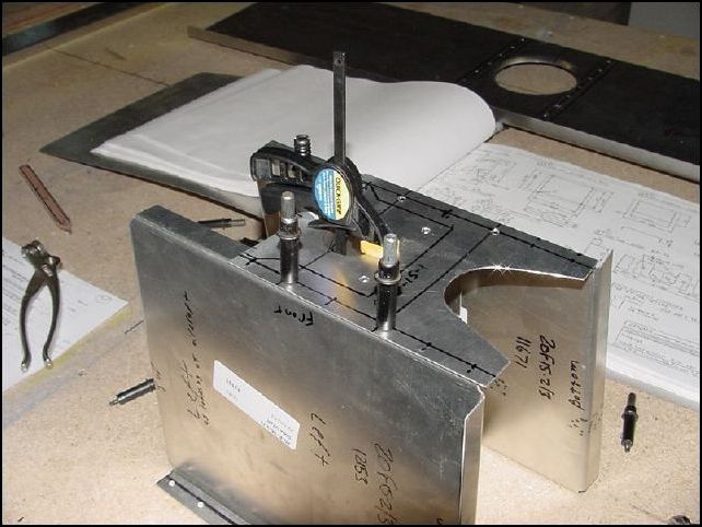 We found a better way to clamp these parts so that we now have room to place the floor Z in position and still have the diaphram clamped in place.