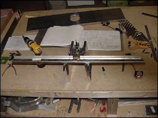 Drill through floor Z into side walls and cleco in place.