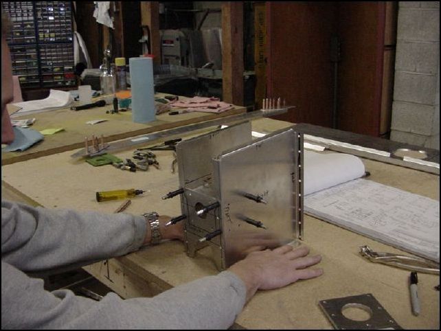 Drill and cleco diaphrams to side walls.