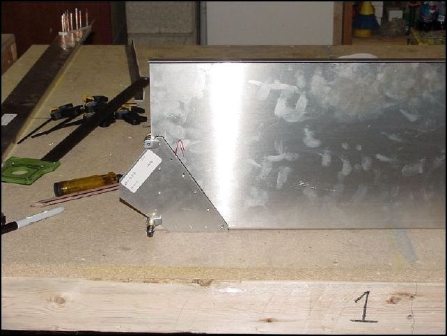 Drill holes in 20-F-10-2 (front wing attach brackets) as per drawing 640-F-10 These holes are AD4.  Do not drill the spar bolt holes to 5/16 at this time.  Position the brackets to the front Z flush to the bottom and 1210mm from tip to tip.